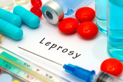 Leprosy - diagnosis written on a white piece of paper. Syringe and vaccine with drugs.