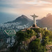 Aerial view of Christ the Redeemer Statue and Corcovado Mountain with Hipodromo da Gavea and Dois Irmaos Hill at sunset - Rio de Janeiro, Brazil